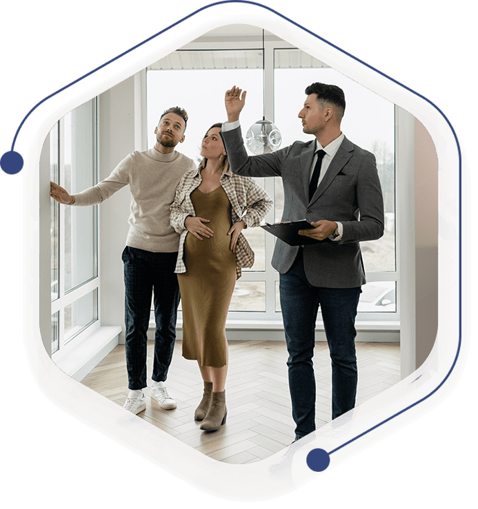 A group of people standing in front of a window.